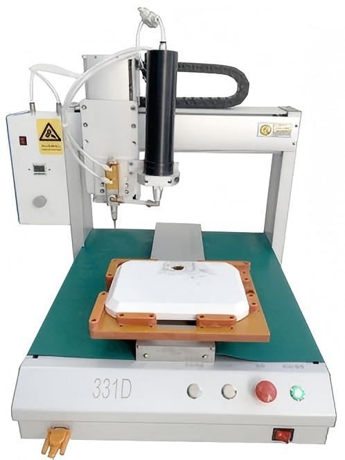 Glue dispensing machine