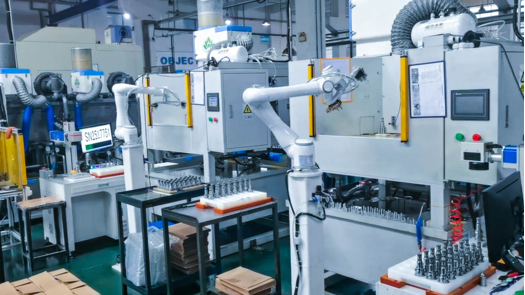 Collaborative robotic arms application for CNC production line